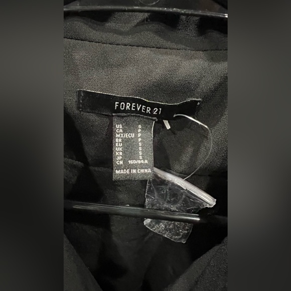 Elegant, Cute Black Forever 21 one piece short romper with long sleeves. - Picture 8 of 8